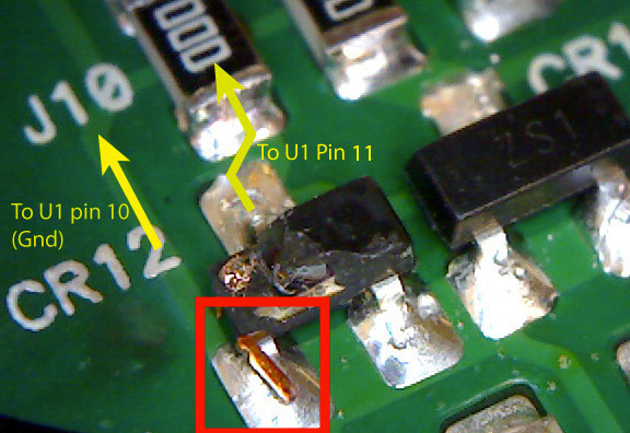 Bad solder joint marked with a red box